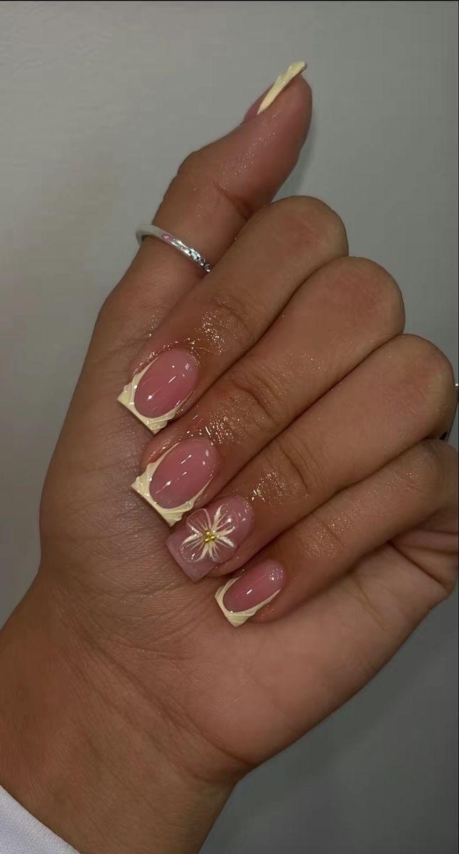 White French tips with flower accents